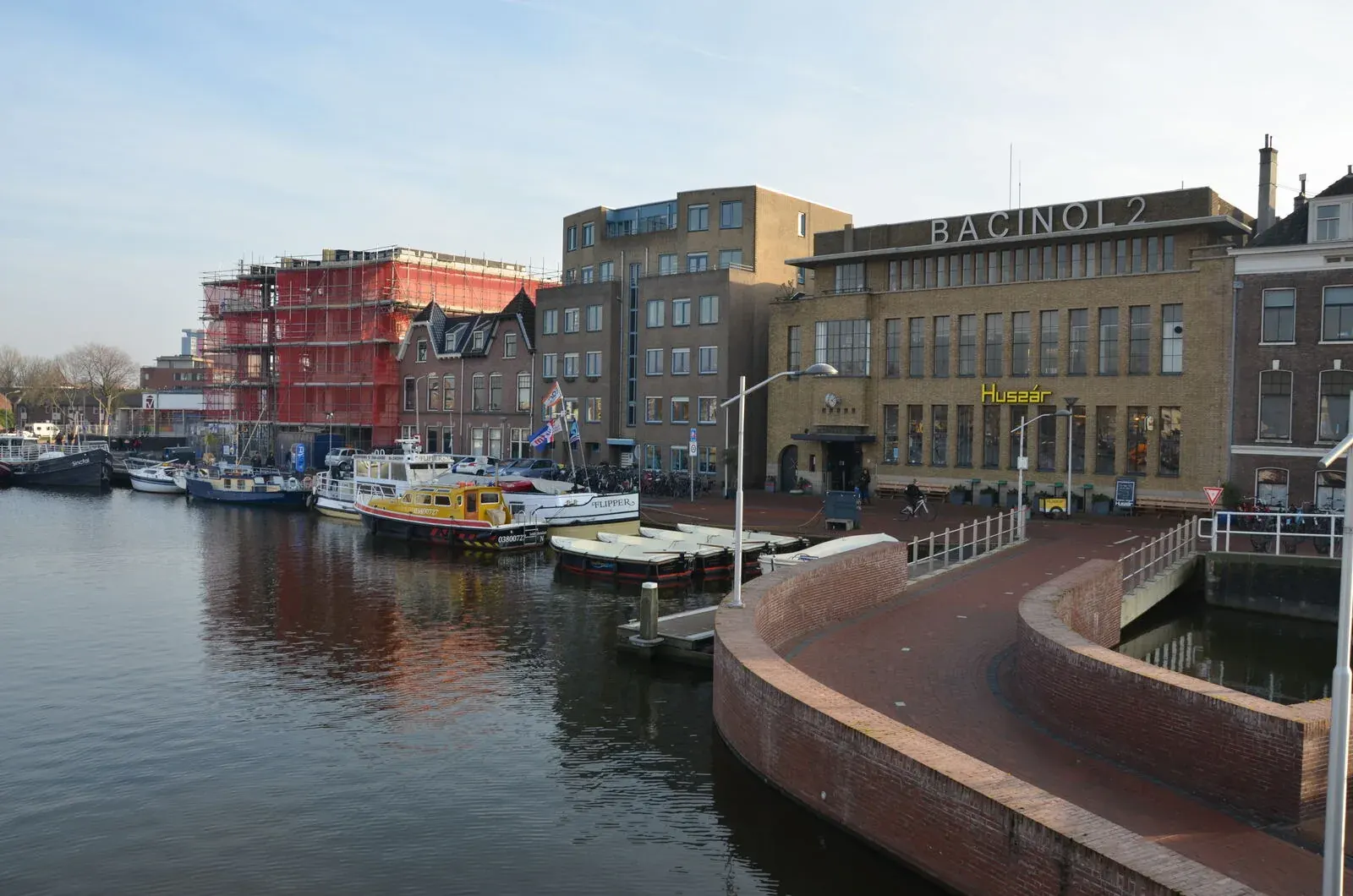 Bicycles parked along the Hooikade in Delft